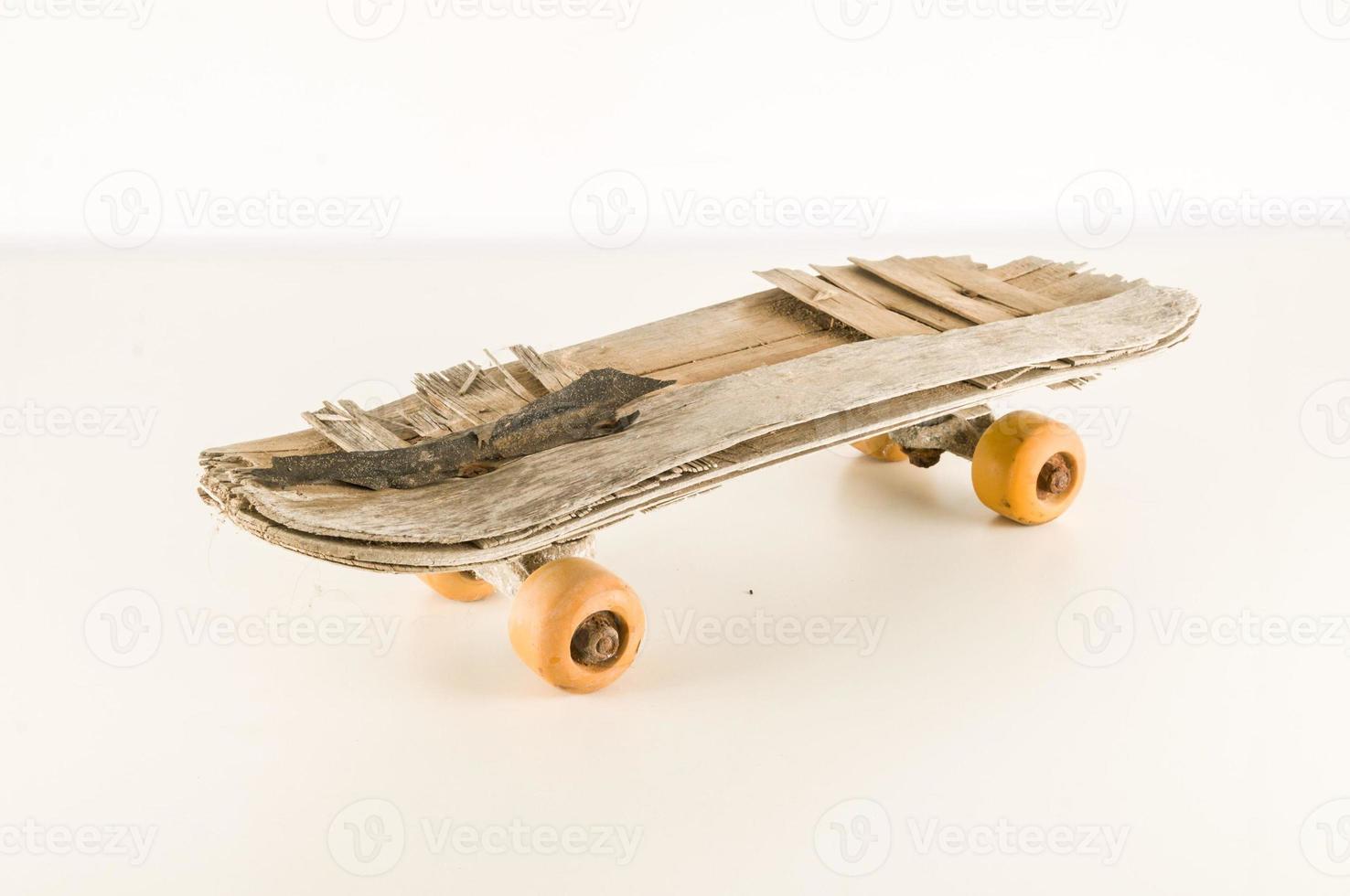 Old worn skateboard photo