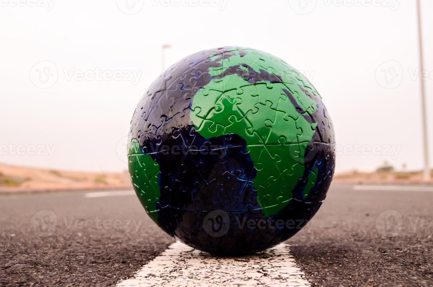 Globe on the road photo