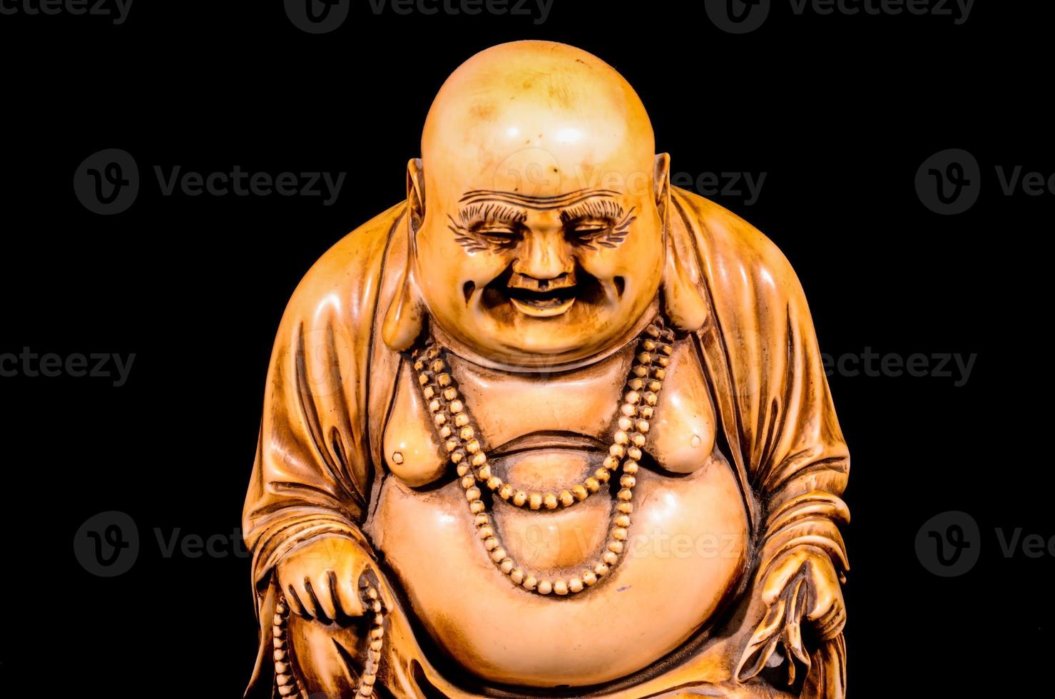 Buddha on black background photo