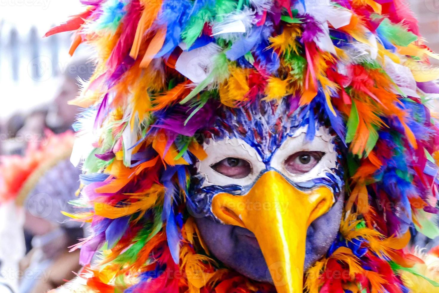 Unidentified person in colourful mask photo