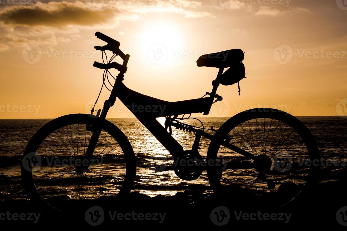 Bicycle at sunset photo