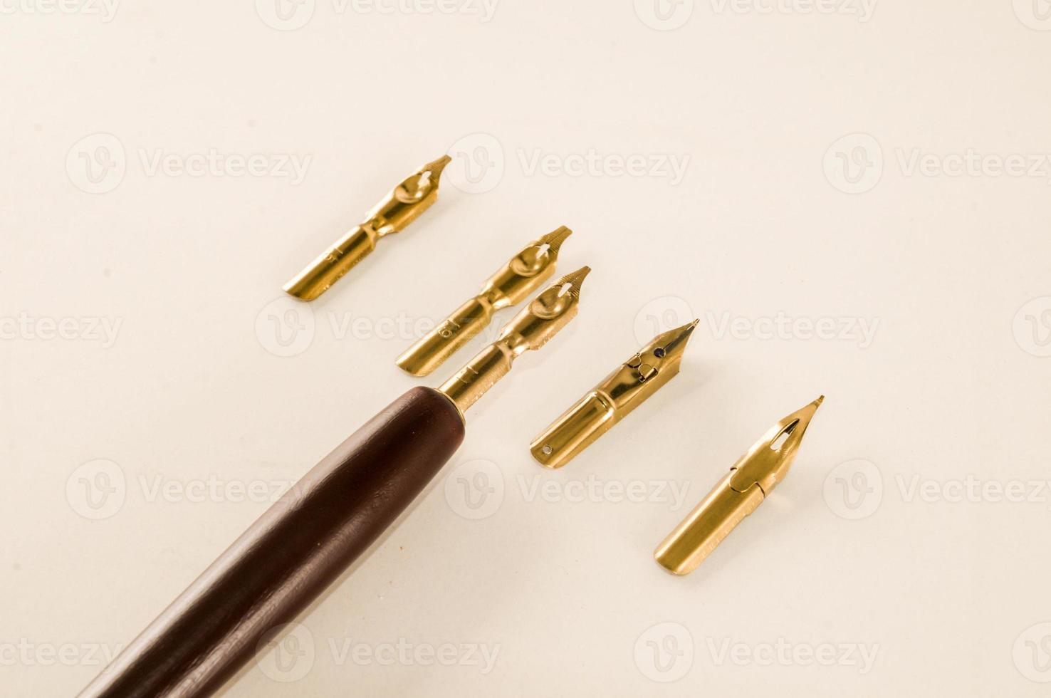 Fountain pen on light background photo