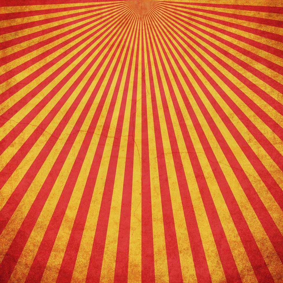 Red and Yellow grunge sunburst vintage background with space photo