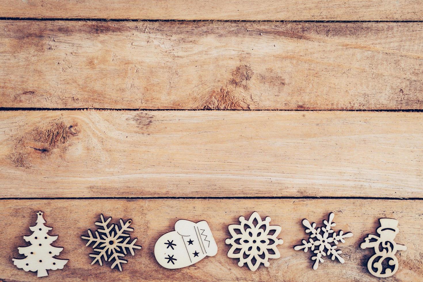 Christmas decoration with wood snowflake on table with copy space photo