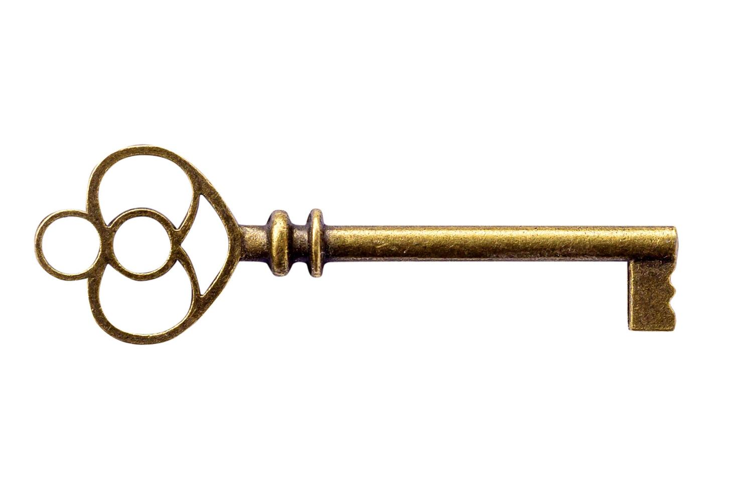 Close up Key vintage on isolated white with clipping path. photo