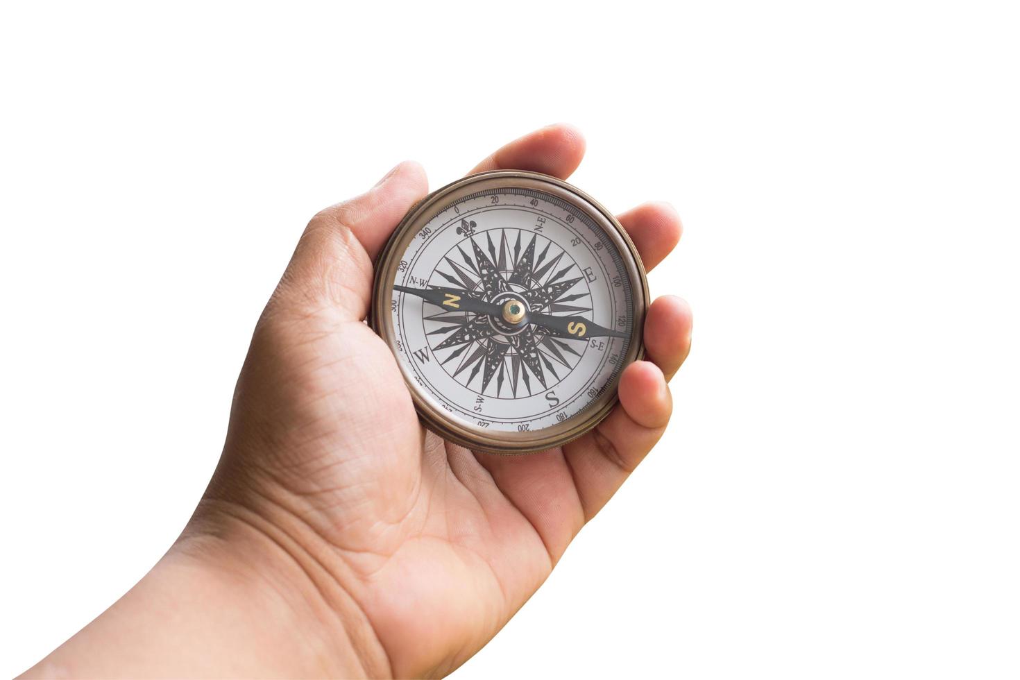 compass on hand man isolated white with clipping path. photo