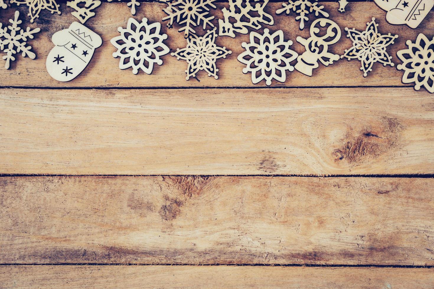 Christmas decoration with wood snowflake on table with copy space photo