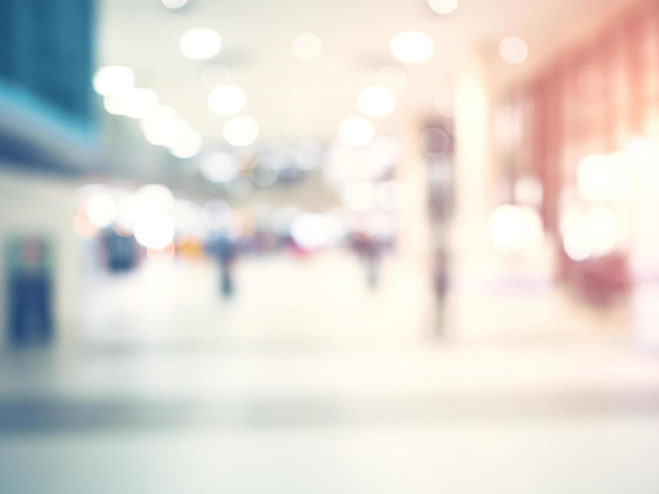 abstract blurred background  crowd people at terminal department at airport with bokeh light. photo