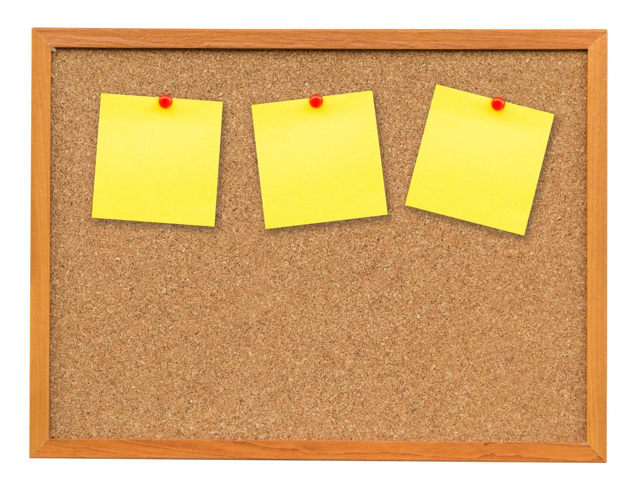 Three note paper on Cork board isolated on white with clipping path. photo