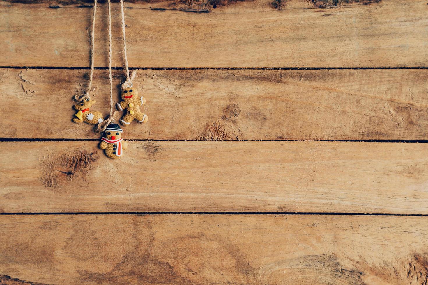 Christmas decoration hanging on wood background texture with copy space. photo