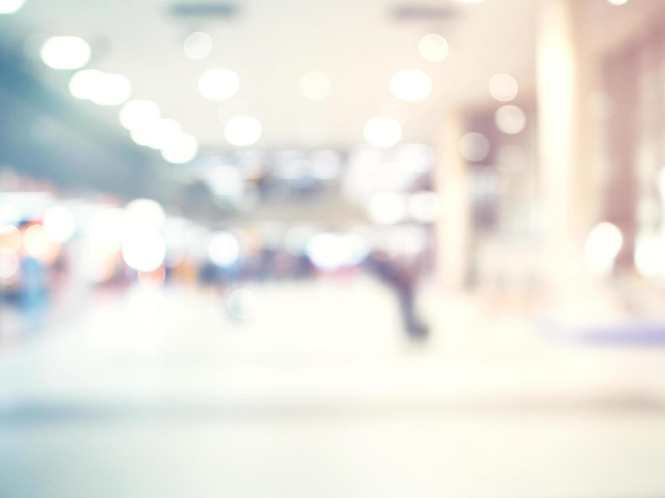 abstract blurred background  crowd people at terminal department at airport with bokeh light. photo