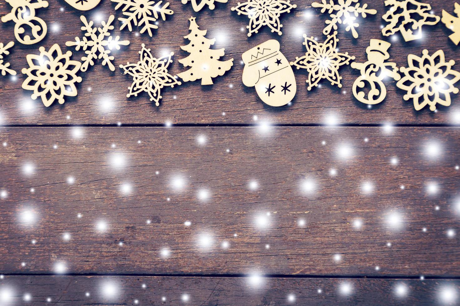 Wood christmas decoration with snow white on wood background with copyspace. photo