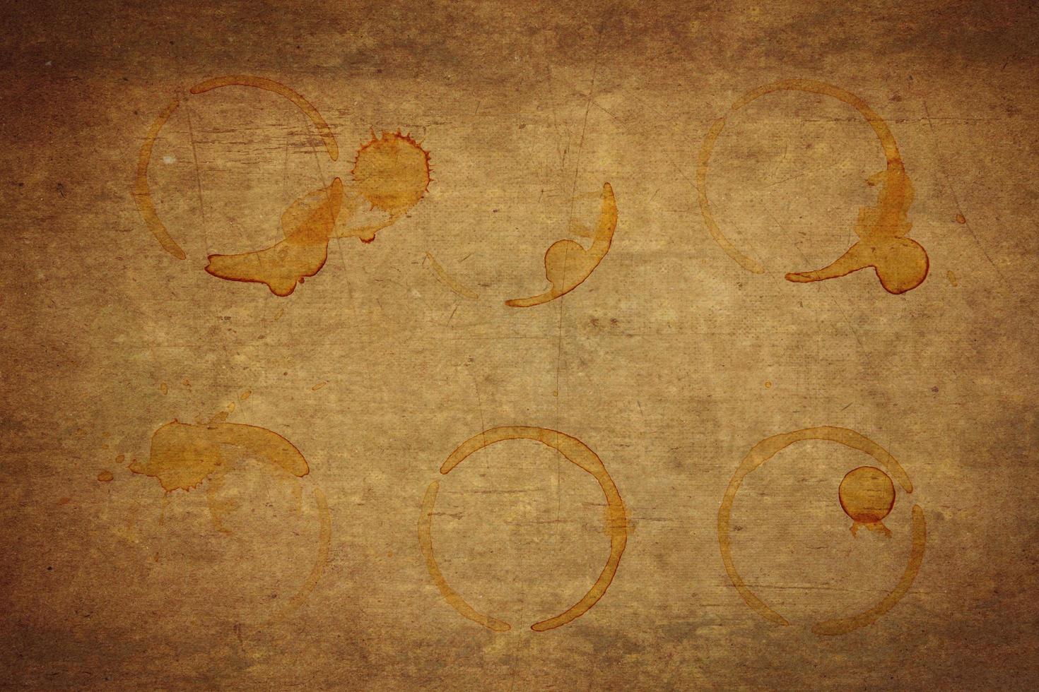 Coffee Stains and coffee cup stains on old paper background. photo