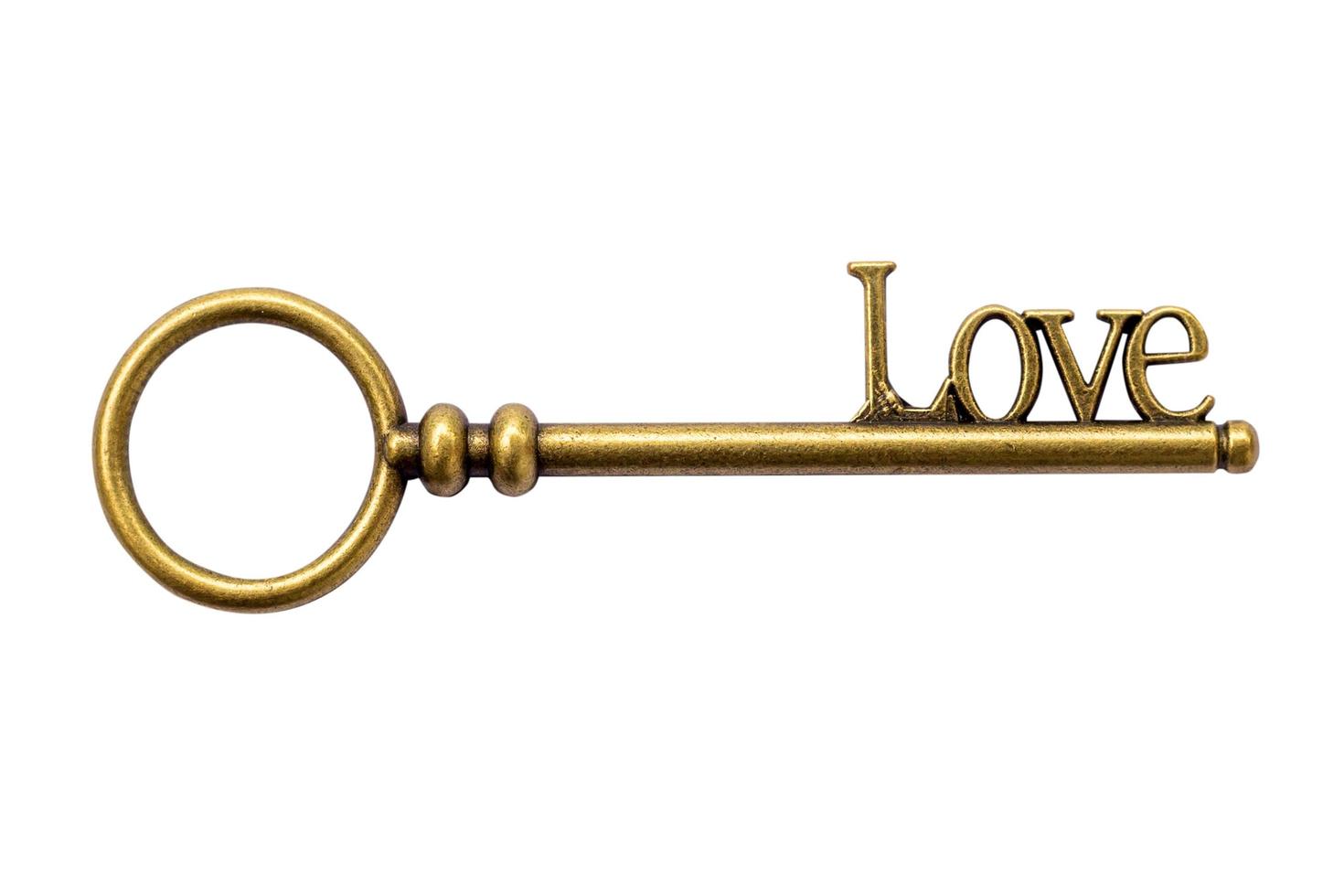 Close up Key vintage and LOVE text on isolate with clipping path. photo