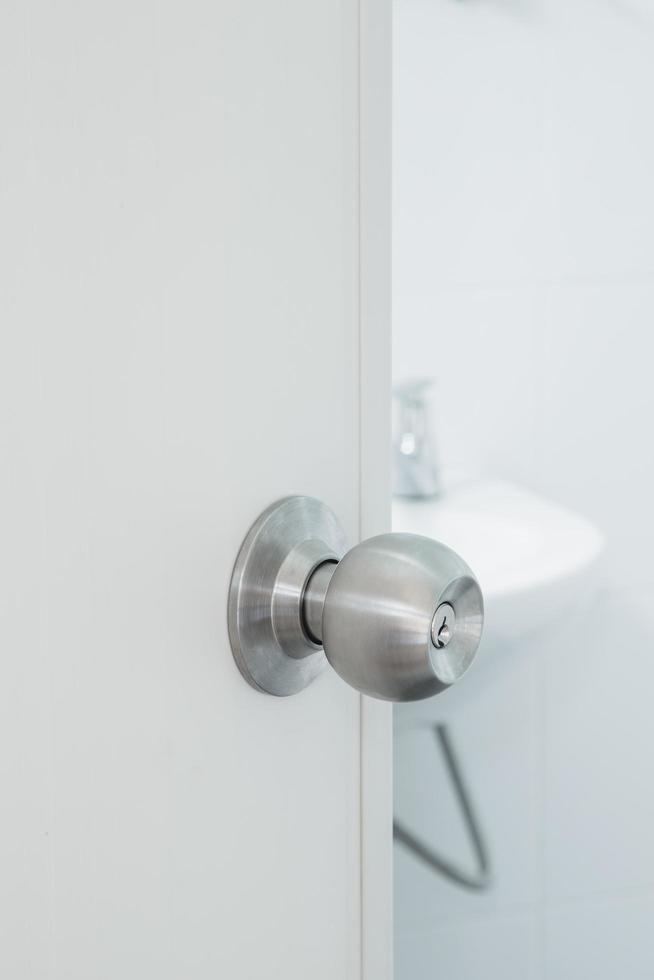 Close up Stainless Steel Door Knob in bathroom photo