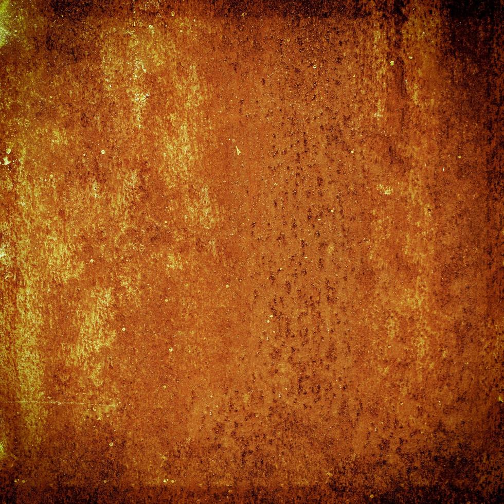 Grunge metal rust and orange texture for halloween background with space photo