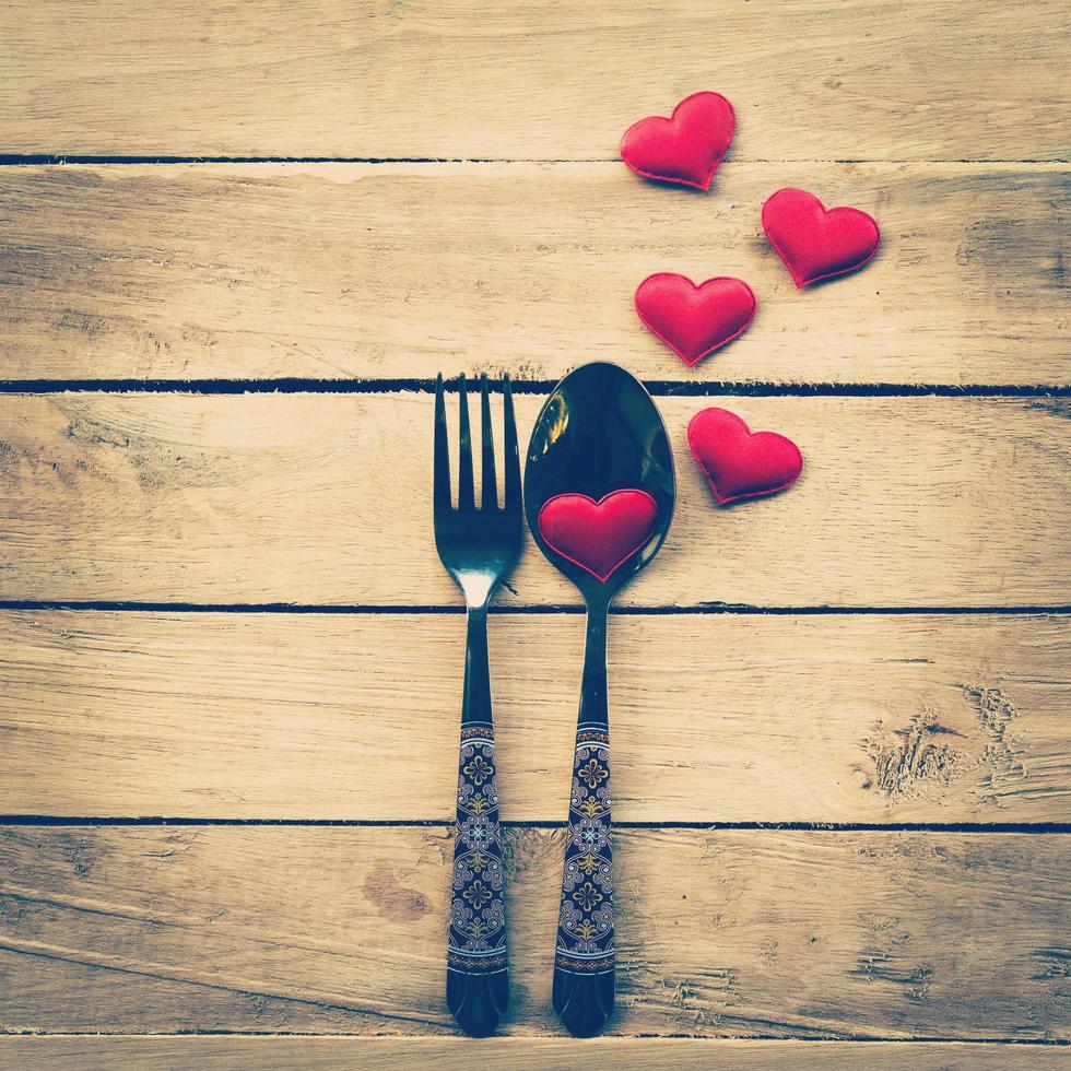 Valentines day dinner with table setting in rustic wood for Vintage style. photo