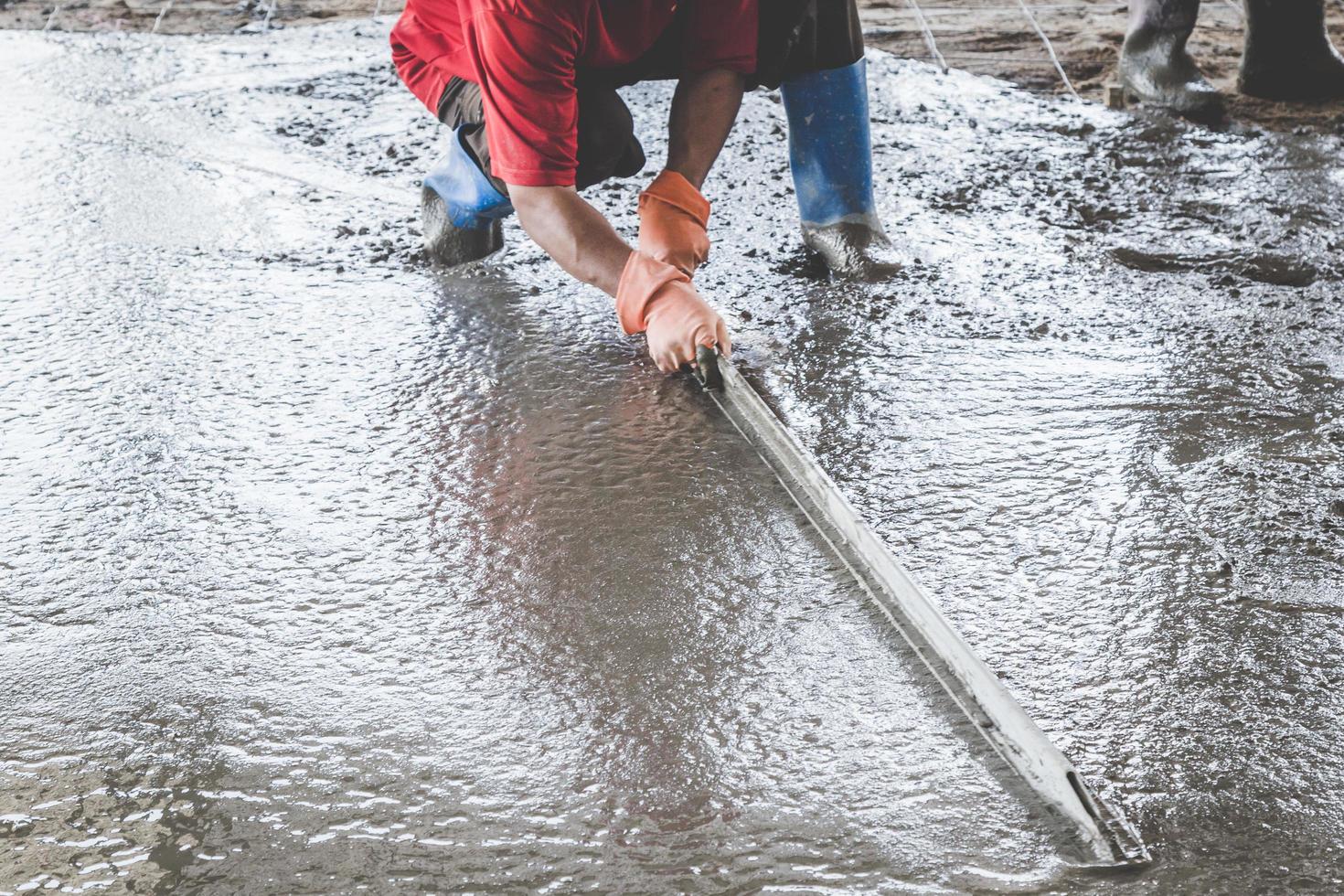 Mason building a screed coat cement photo