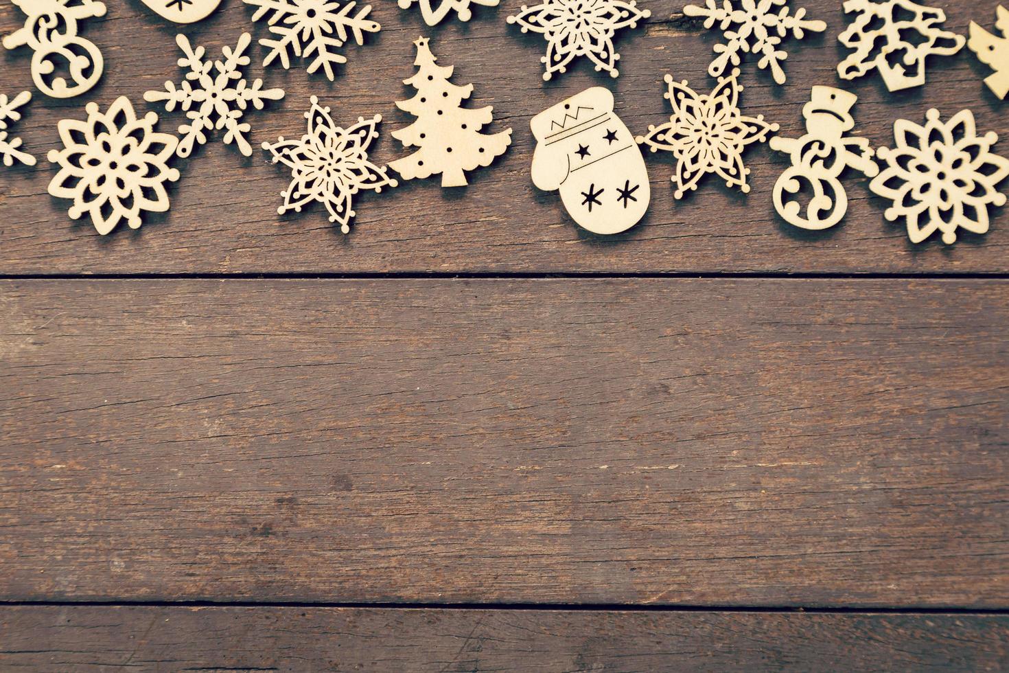 Wood christmas decoration on wood background with copyspace. photo