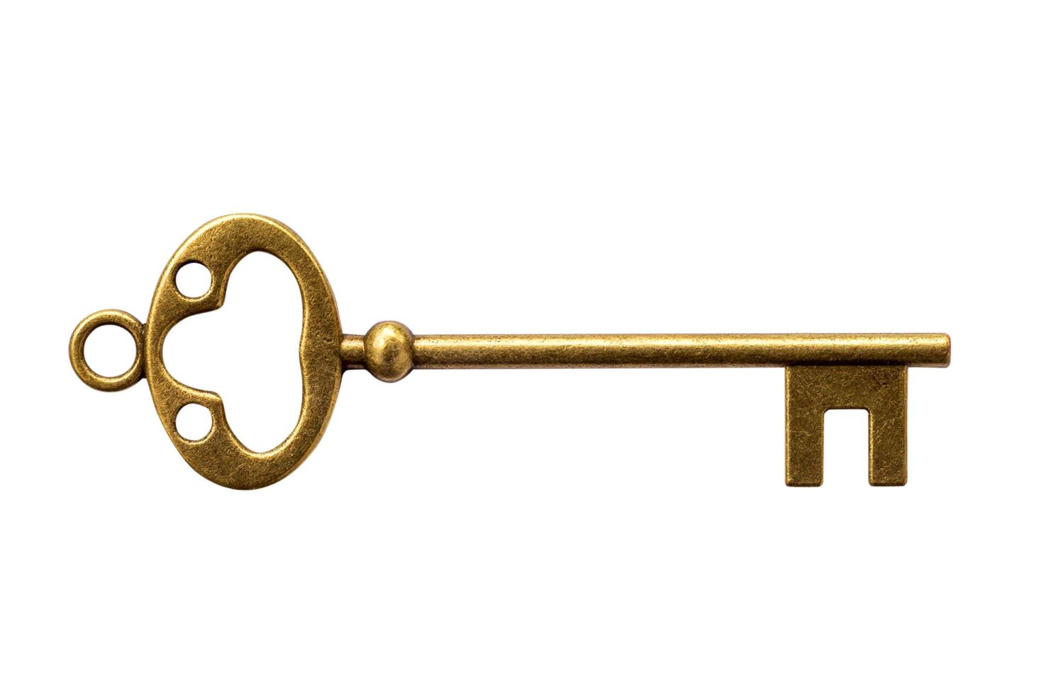 Close up Key vintage on isolated white with clipping path. photo