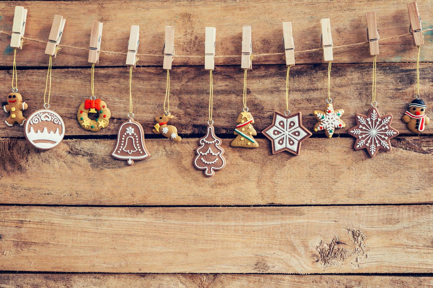 Ornamental christmas decoration hanging on wooden for christmas background with space photo