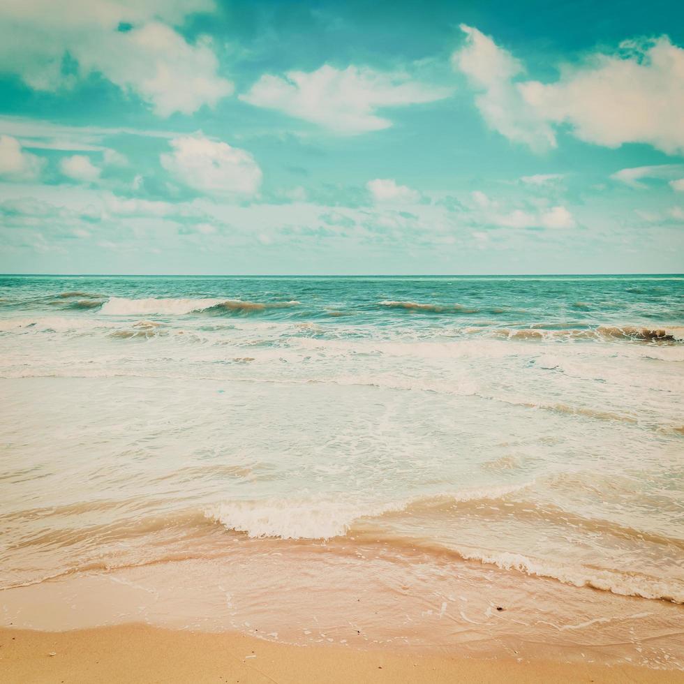 sea wave and beach with vintage tone. photo