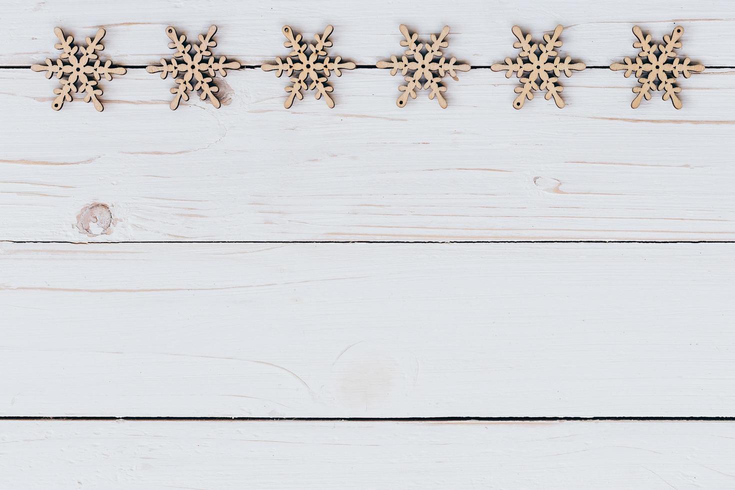 Ornaments christmas decoration wooden on wooden white  with space. Christmas background. photo