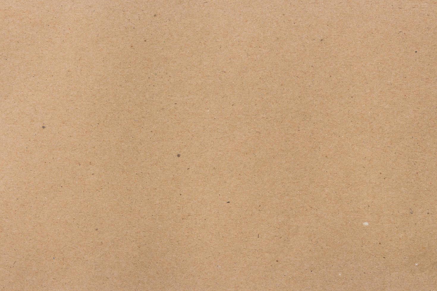 close up brown recycled paper texture background photo