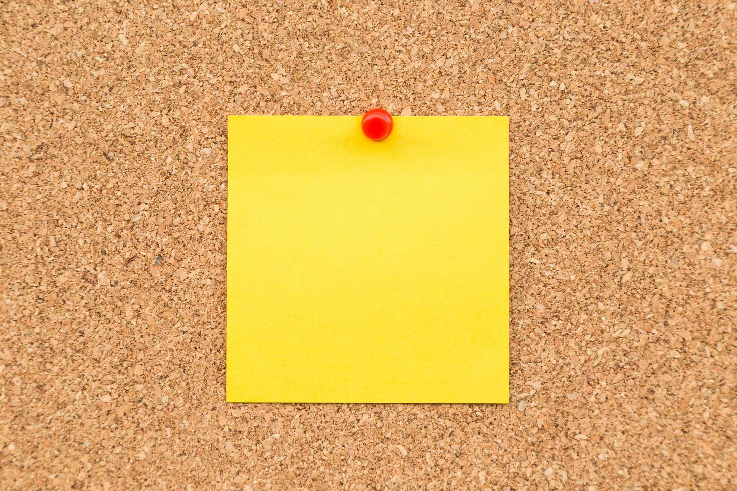 Sticky yellow blank note with space for text. photo