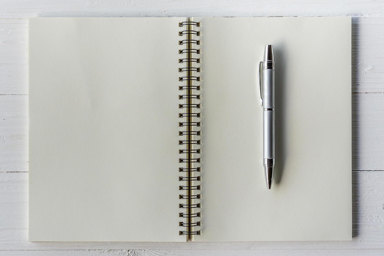 White Book on Brown Wooden Table · Free Stock Photo