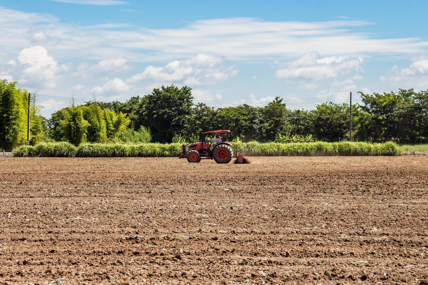 tractor working in field agriculture. photo