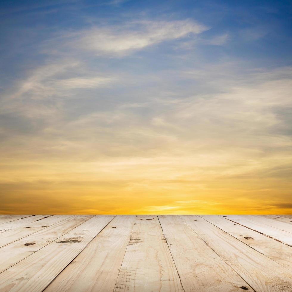 wood floor and beautiful sunset with space photo