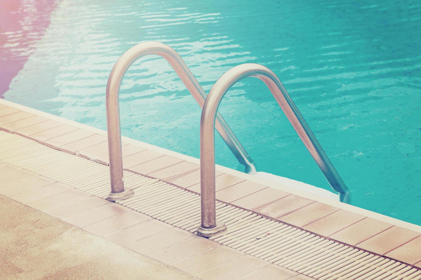 Swimming pool with stairs with vintage effect. photo