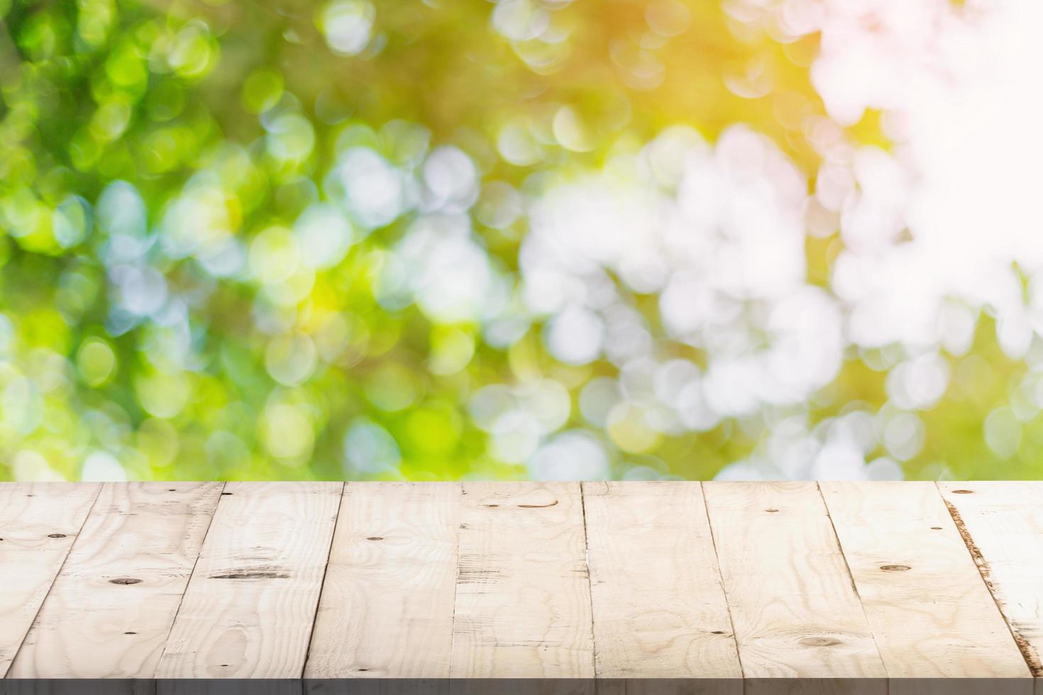green bokeh in garden and table with space photo