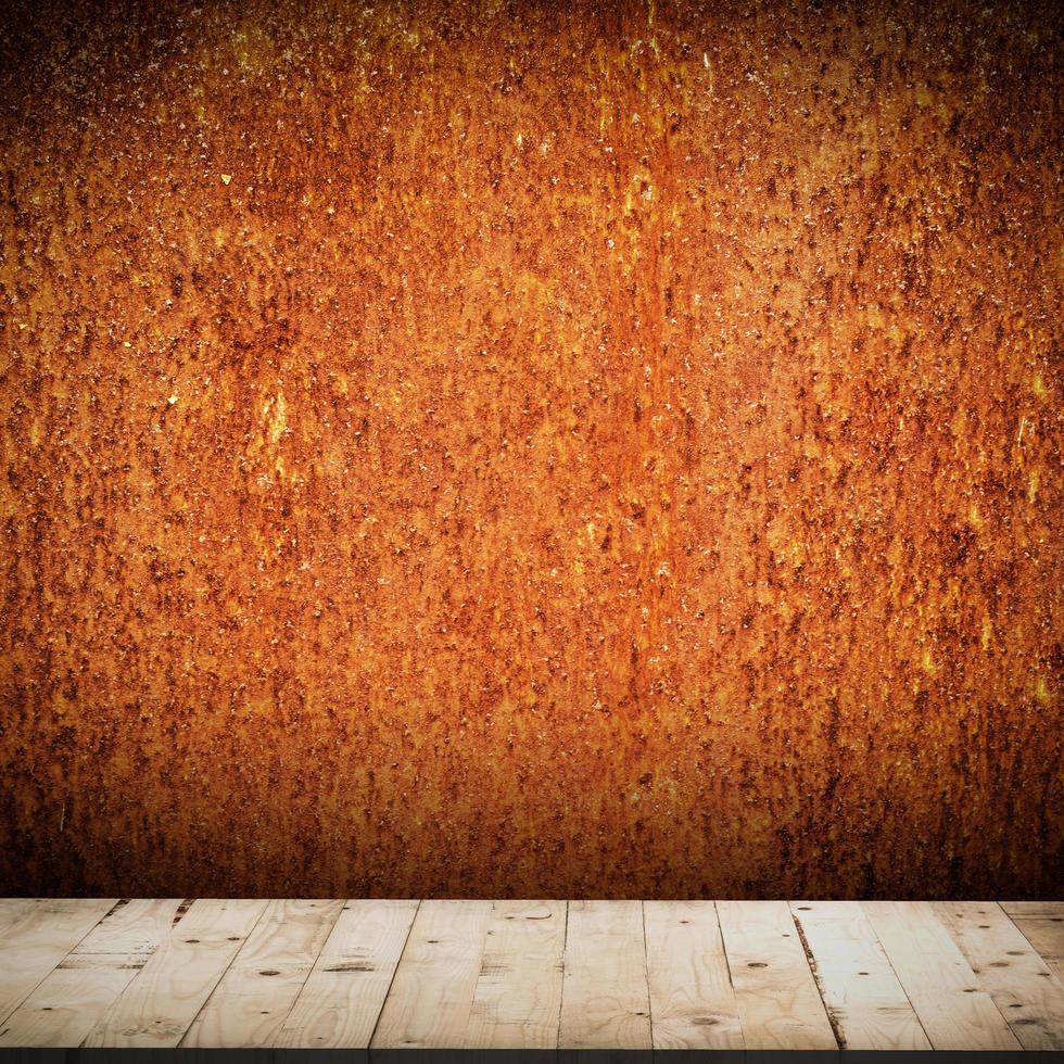 grunge orange background and wood table for halloween background with space photo