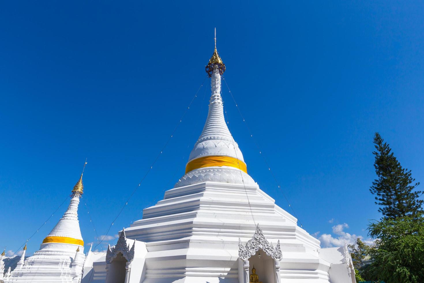 White unique pagoda in Wat Phra That Doi Gongmoo landmark of Maehongson, Thailand. photo