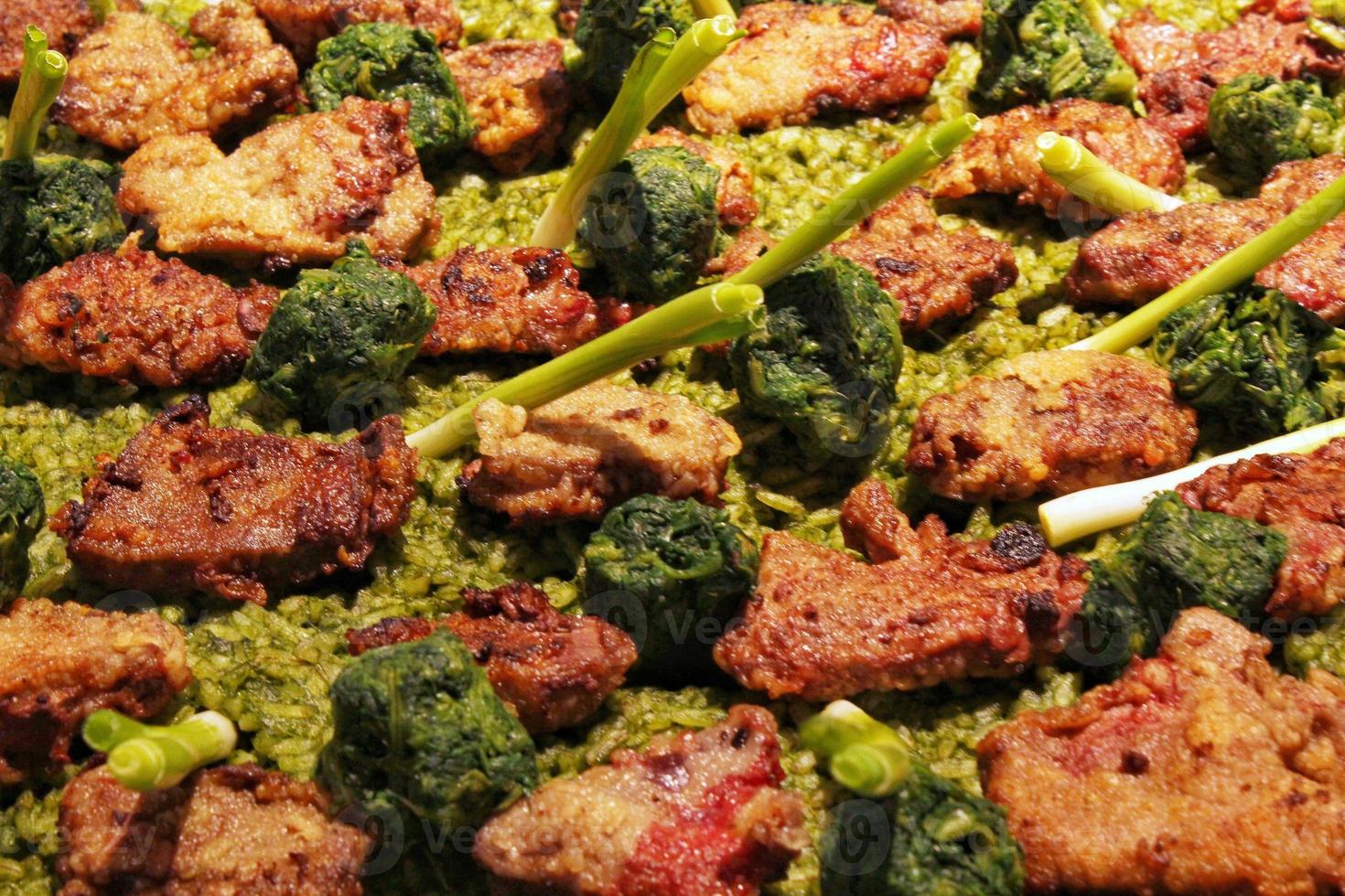 Homemade cuisine delicious beef meat with spinach and green vegetables. Appetizing dish. Healthy food concept. Top view, copy space, close up photo