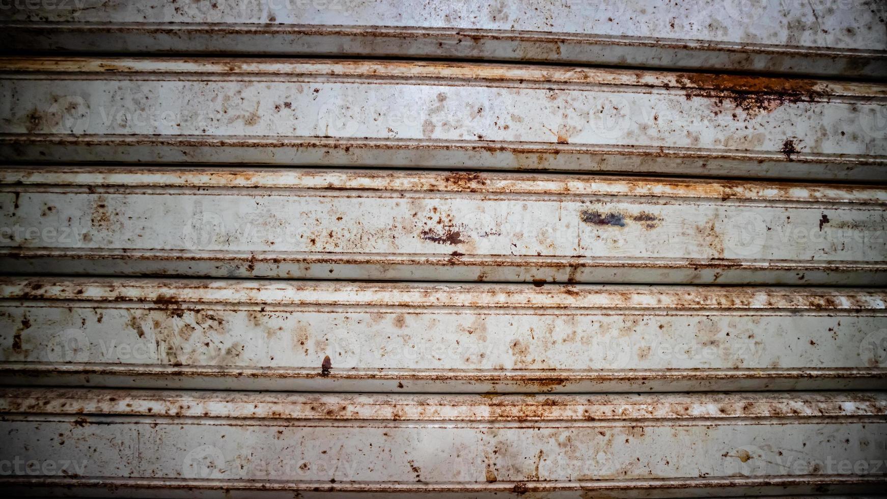 rusted iron striped garage door photo