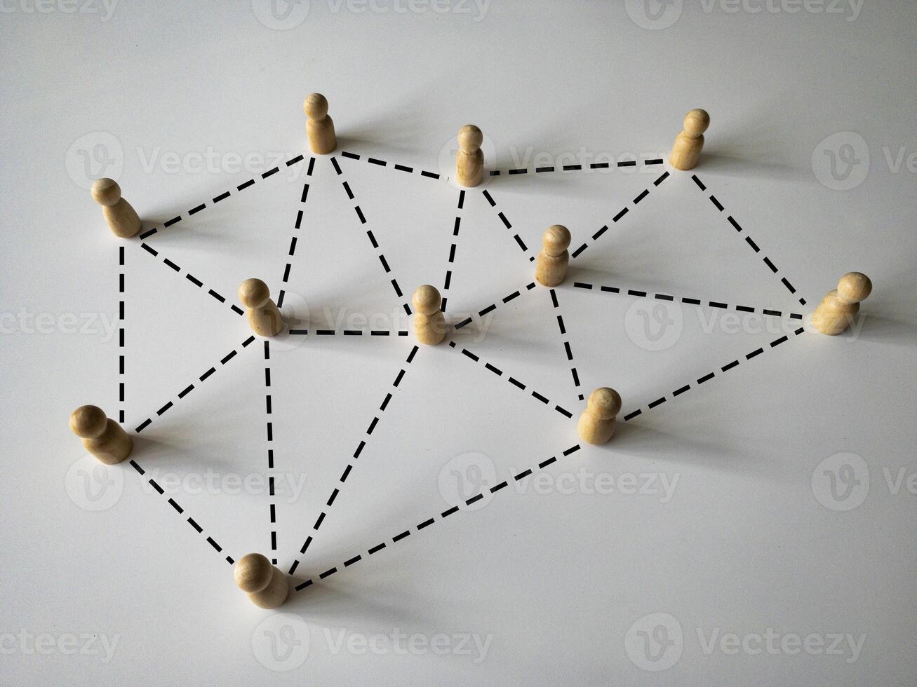 Wooden people figure networking concept. Online internet communication and networking concept photo