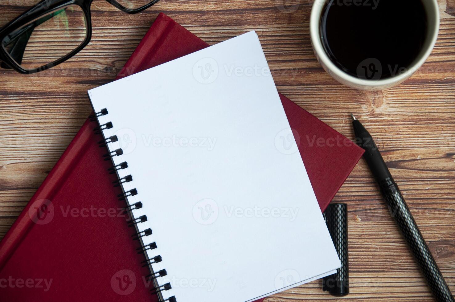 Top view of notepad with customizable space for text or message. Copy space and message concept. photo