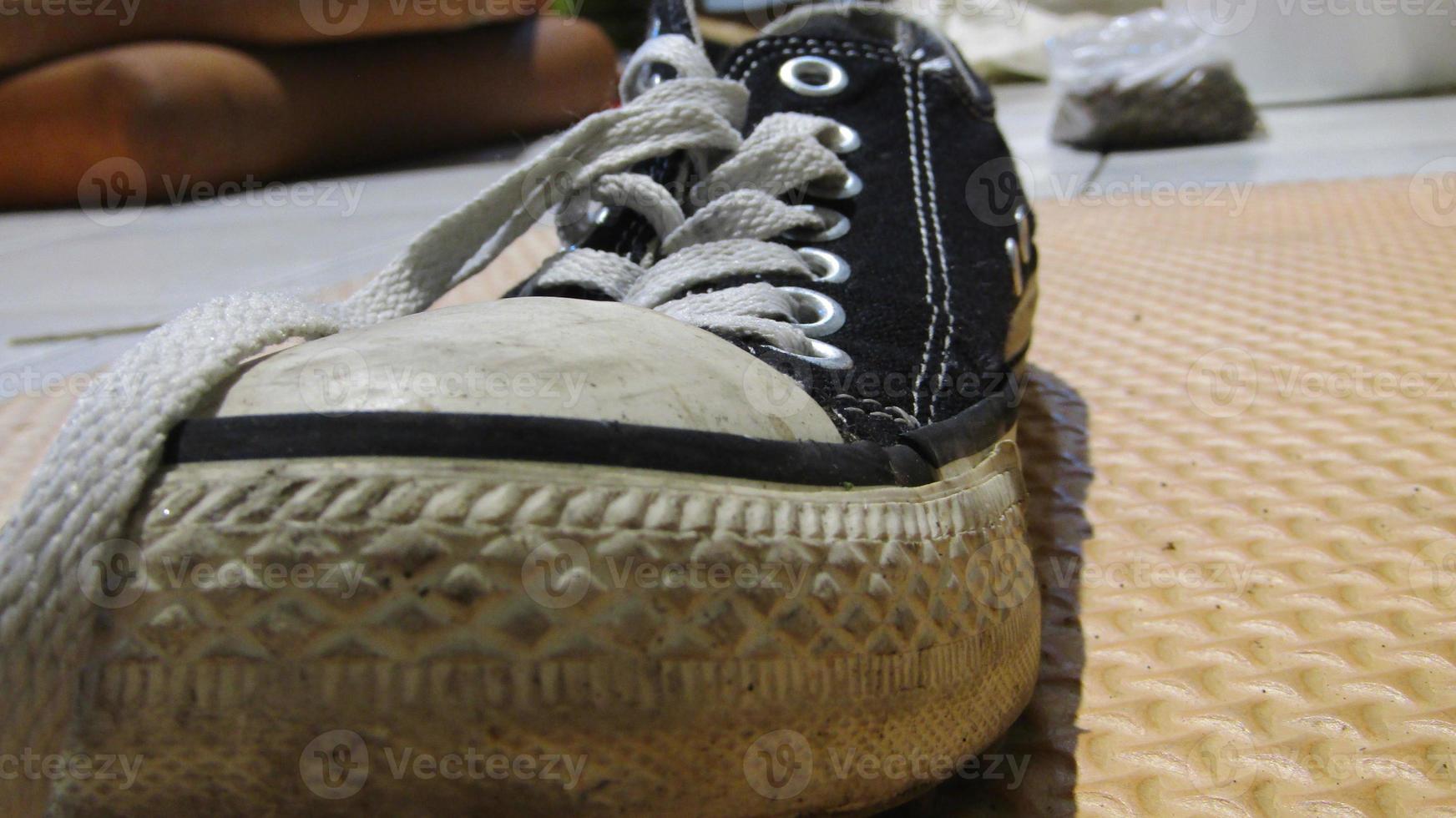 close up used sneaker casual shoe photography photo