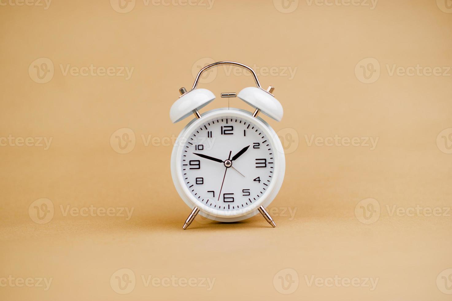 white alarm clock stop watch photo 19935431 Stock Photo at Vecteezy