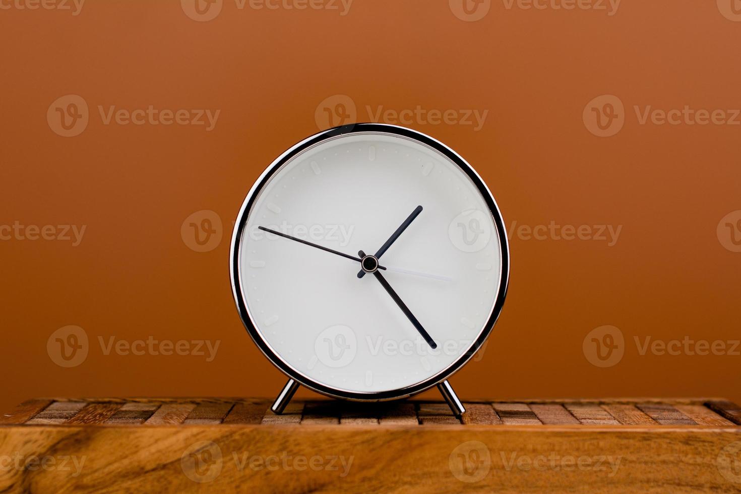 white alarm clock stop watch photo