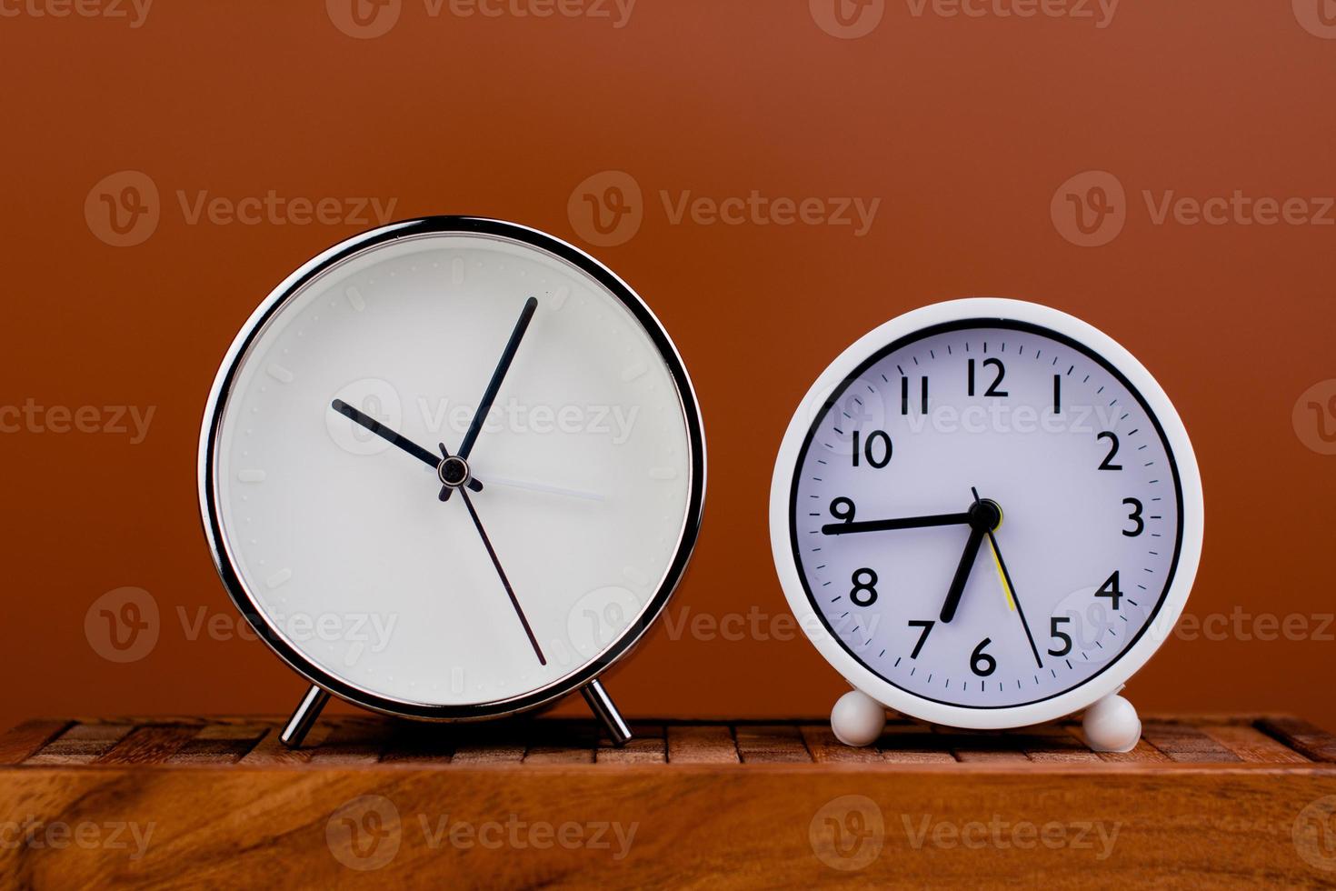 white alarm clock stop watch photo 19935466 Stock Photo at Vecteezy