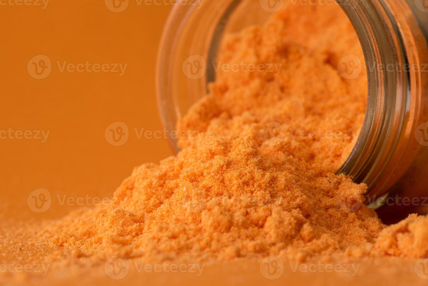 Cheddar Cheese Powder Spilled from a Jar 19935552 Stock Photo at Vecteezy