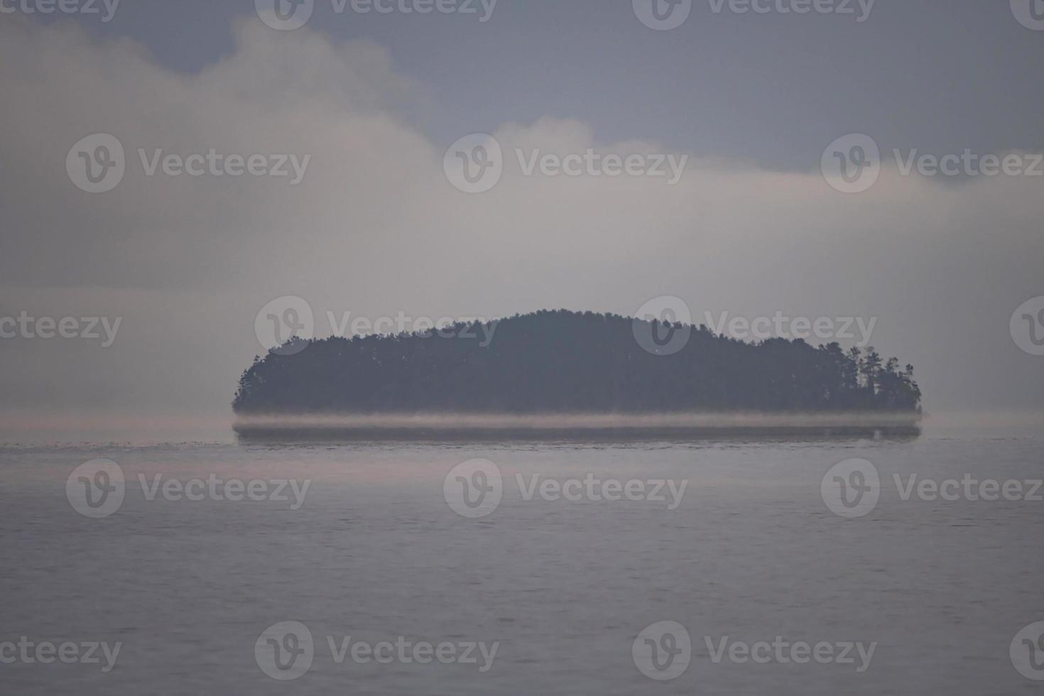 Island Appearing out of the Morning Fog photo