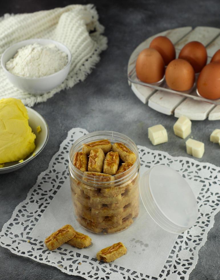 Kastengel or kue keju Indonesian cheese cookie in the form of sticks. popular cookies during festive occasion like idl fitr photo