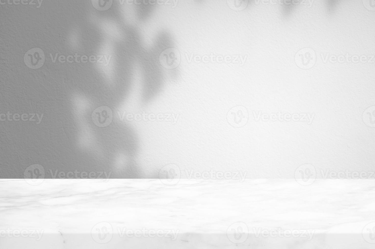 Marble Table with Leaves Shadow on Stucco Wall Texture Background, Suitable for Product Presentation Backdrop, Display, and Mock up. photo
