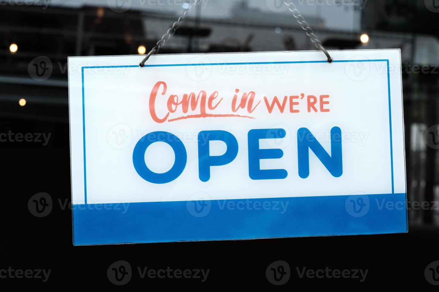 Open Sign in front of a Cafe and Restaurant. photo