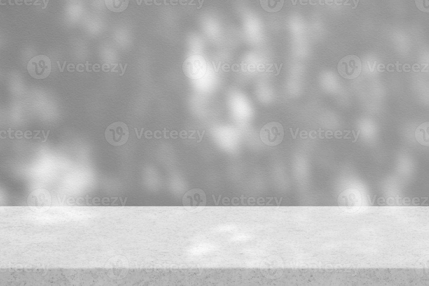 White Sand Table with Shadow of Garden on Surface of Concrete Wall Background, Suitable for Product Presentation Backdrop, Display, and Mock up. photo